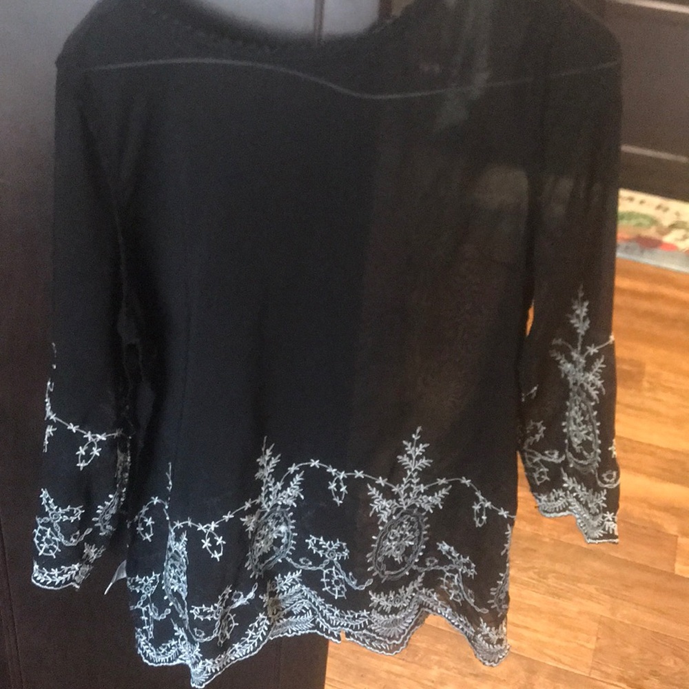Black sheer blouse with white trim